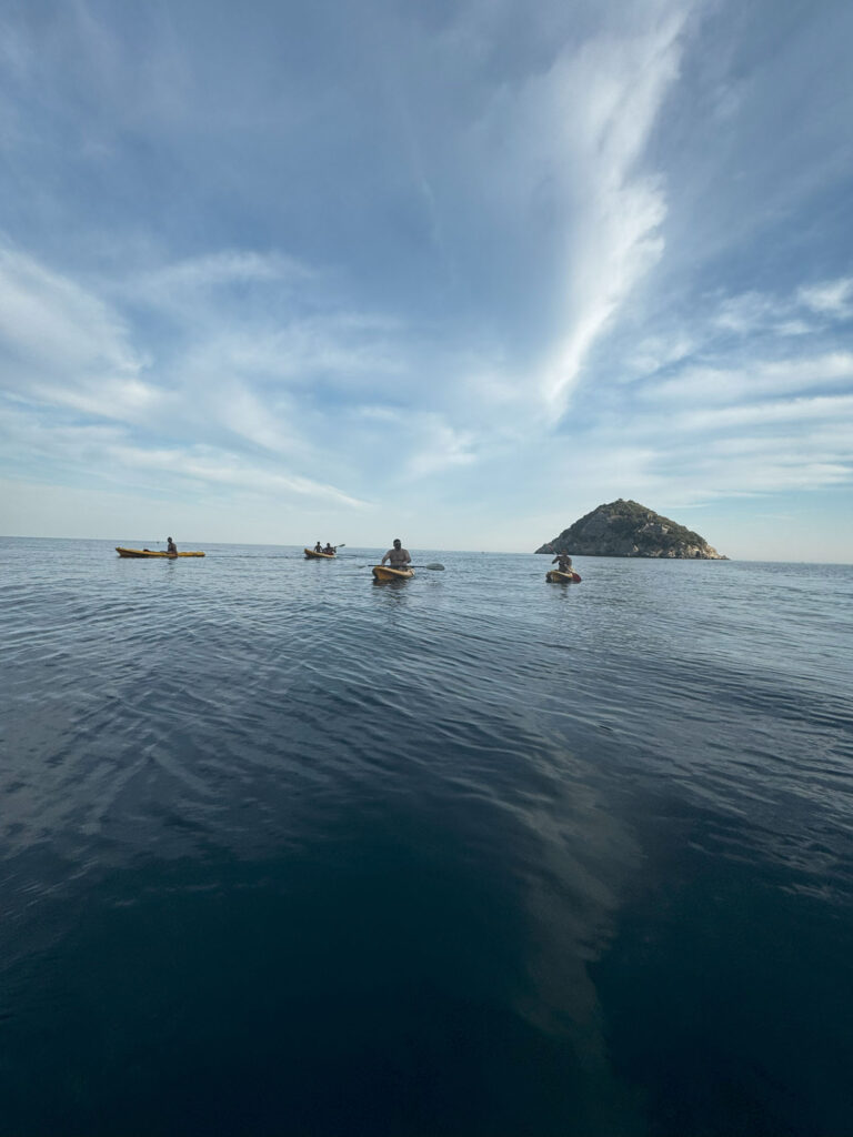 vert canoe isola tramonto